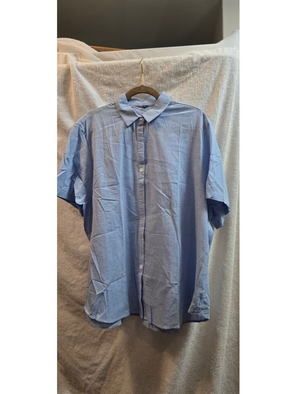 Women's 22-24 blue short sleeve collared blouse